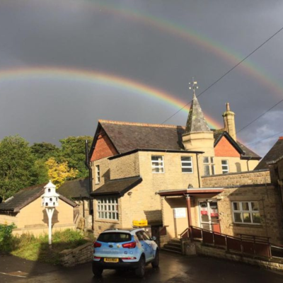 reubens retreat with a rainbow